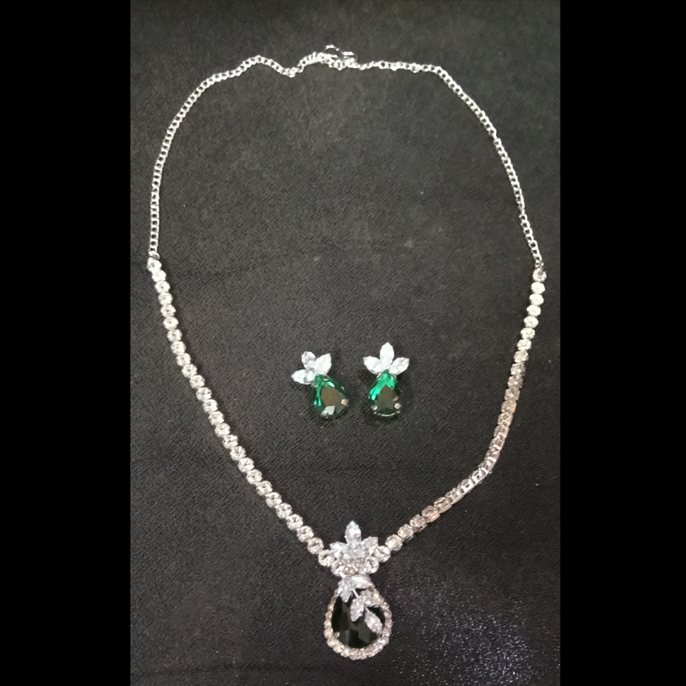 elegant silver plated green crystal pendant necklace set for women with matching drop earrings elegant silver plated green crystal pendant necklace set for women with matching drop earrings