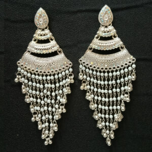 elegant silver toned chandbali earrings with pearl tassels
