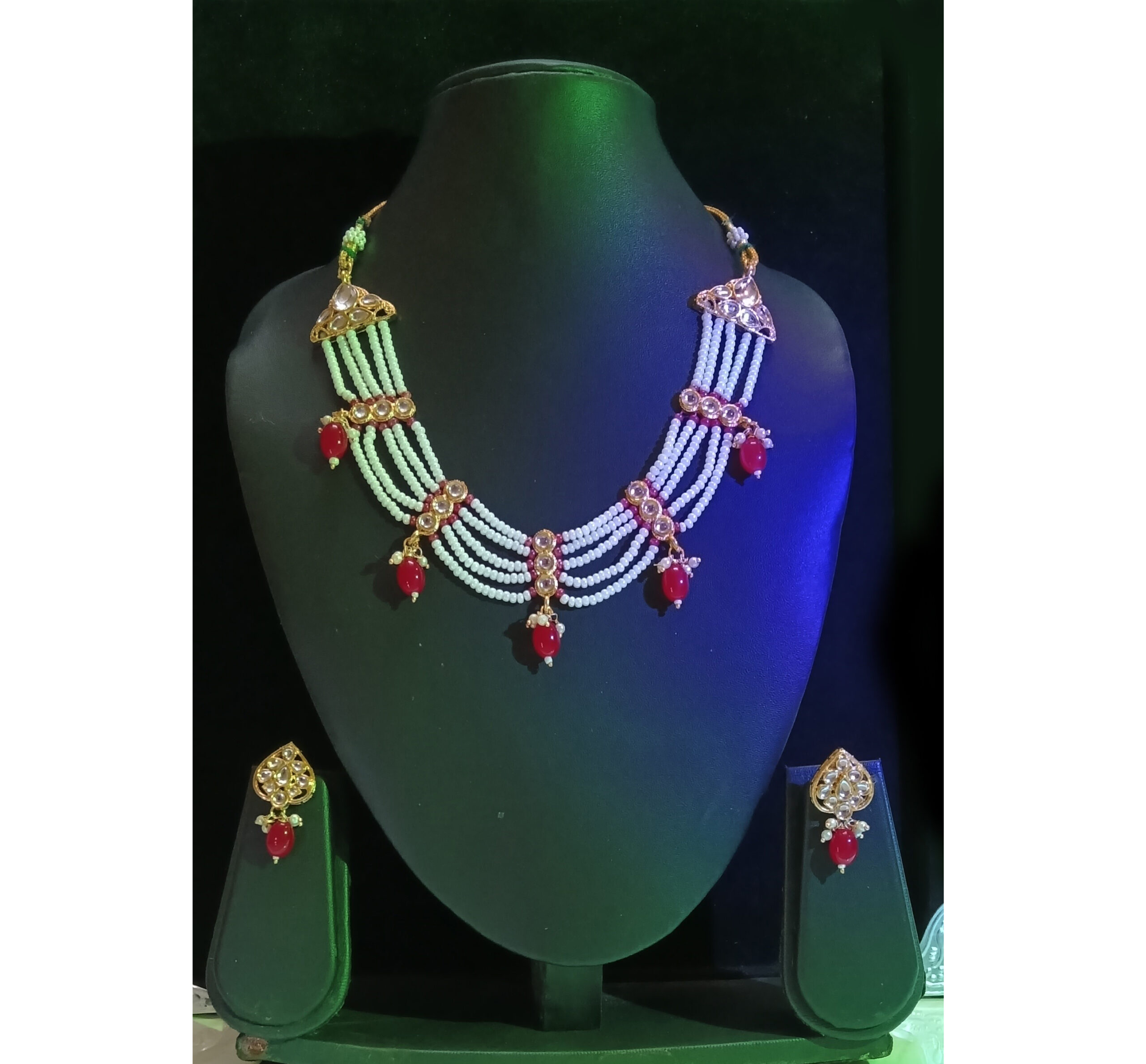 elegant kundan choker necklace set with pearl strands and red bead droplets elegant kundan choker necklace set with pearl strands and red bead droplets