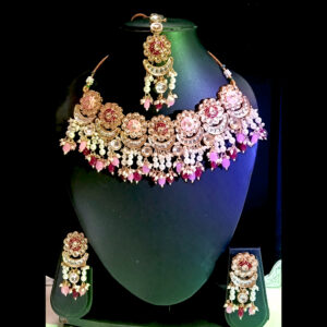 elegant floral kundan choker set with pastel pink & maroon accents and maang tikka