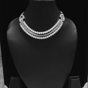 layered pearl & crystal silver toned necklace set with geometric earrings